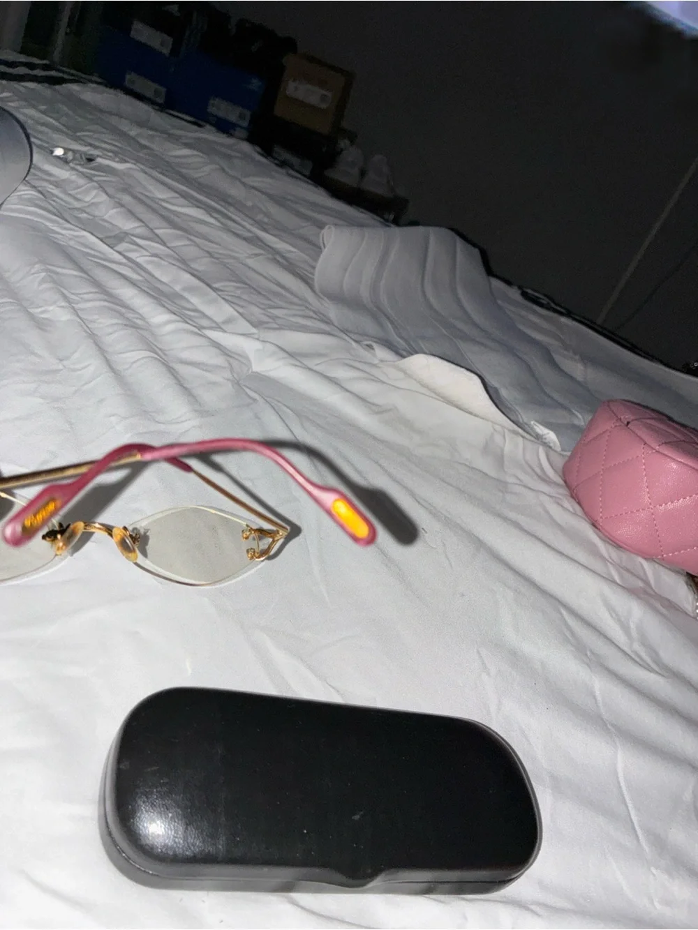 Cartier Gold Rimless Women's Glasses with Subtle Pink Temples